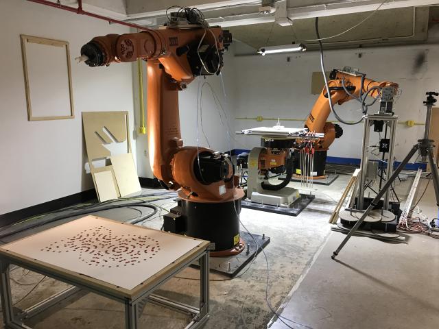 Two KUKA robotic arms in the Tech Lab