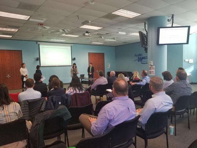 Presenting to a room of stakeholders at Austin Water